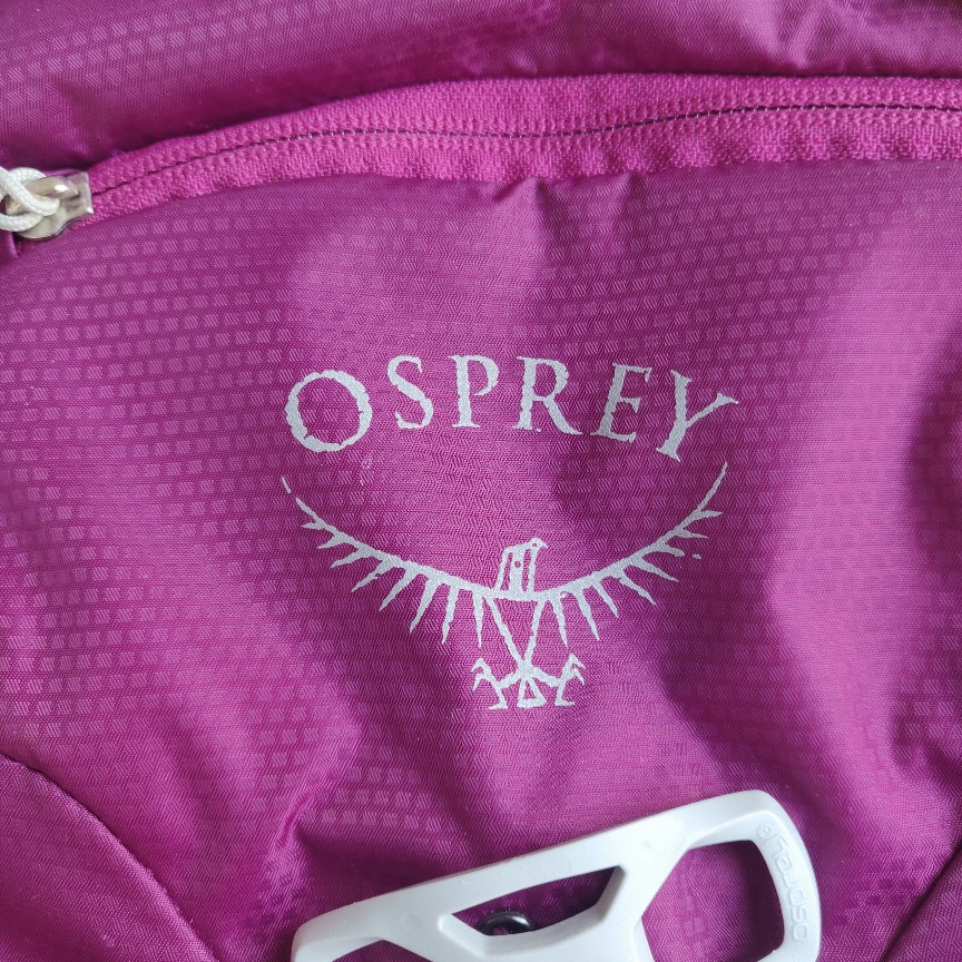 front logo Osprey Tempest 8 women's hiking backpack in "Magnificent Magenta" colorway