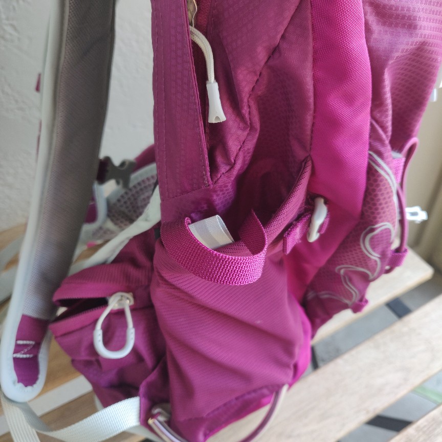 side view Osprey Tempest 8 women's hiking backpack in "Magnificent Magenta" colorway