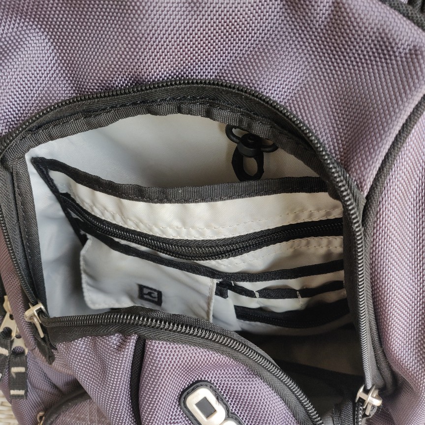 unzipped silver OGIO Metro Backpack internal organization