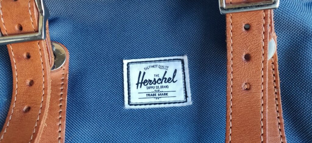 Herschel Little America 25L backpack tag