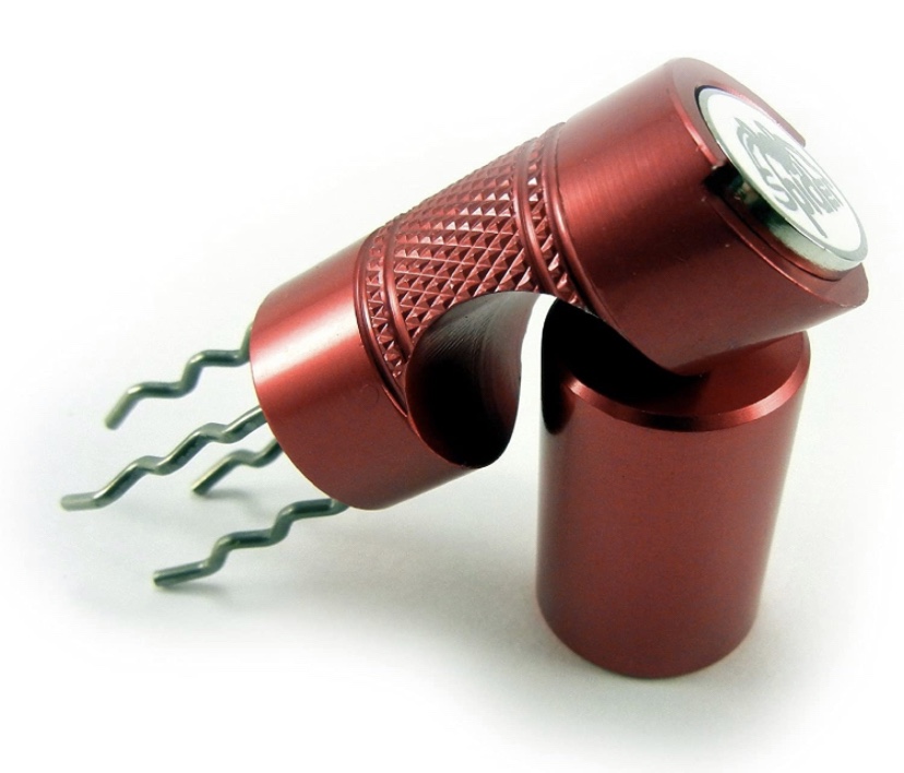 red metal divot toll with non-standard metal prongs